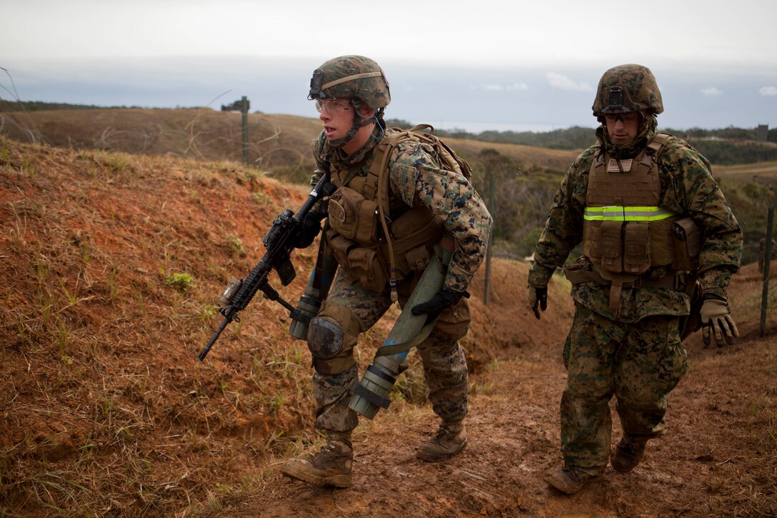 Lance Cpl. Timothy Fariara, a rifleman with Battalion Landing Team 1st Battalion, 5th Marine Regiment, 31st Marine Expeditionary Unit, advances to a covered position during a live-fire exercise here, Jan 4. The Marines and Sailors of BLT 1/5 conducted this training to hone their combat skills in a jungle environment. The 31st MEU is the only continuously forward-deployed MEU and is the Marine Corps’ force in readiness in the Asia-Pacific region.