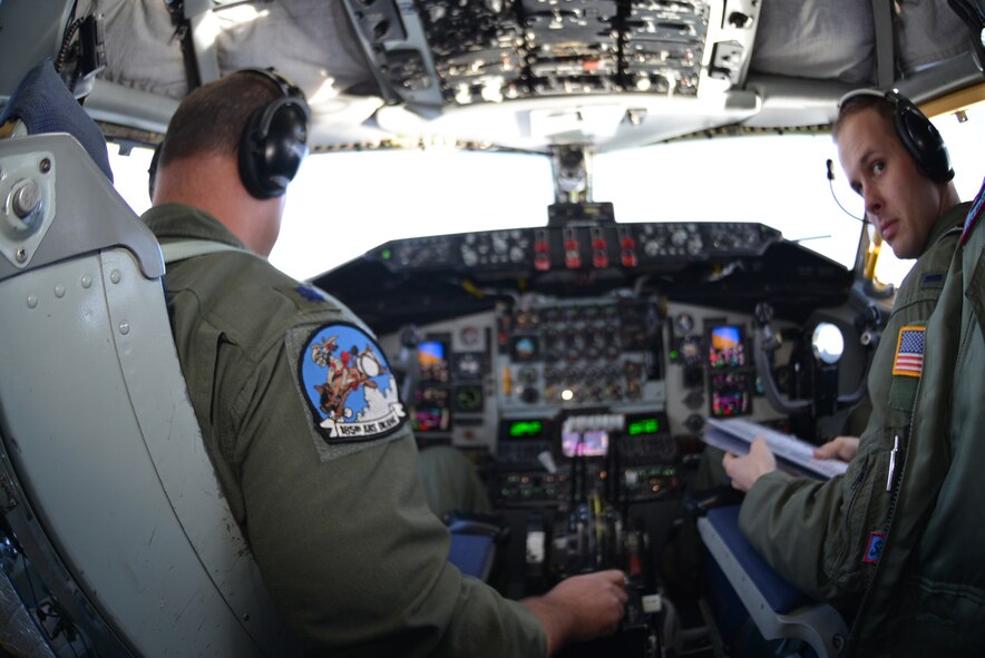 Lt. Col. Tom Haley and 1st Lt. Casey McCormack, KC-135 pilots from the 137th Air Refueling Wing, Oklahoma Air National Guard, flew the tanker that allowed for Alaska civic leaders to watch Reserve F-22 pilots refuel Jan. 5. (U.S. Air Force Reserve/ Capt. Ashley Conner) 