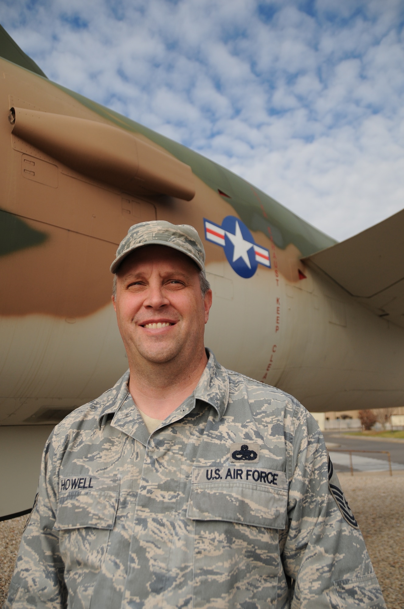 Senior Master Sgt. Mark Howell, 419th Maintenance Squadron avionics flight chief, stands in front of a static airplane here at Hill Air Force Base, Utah. Howell is the new wing representative for the Employer Support of the Guard and Reserve and aims to educate the wing about the ESGR. (U.S. Air Force photo/Staff Sgt. Heather Skinkle)