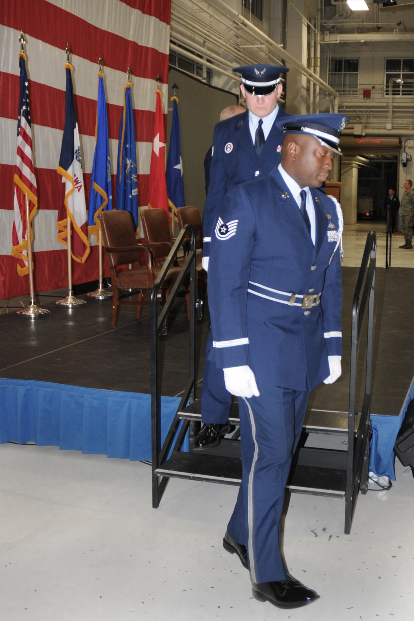 Tech. Sgt. Patrick Kazeze (front) performs in the 132nd Fighter Wing (132FW) Honor Guard.