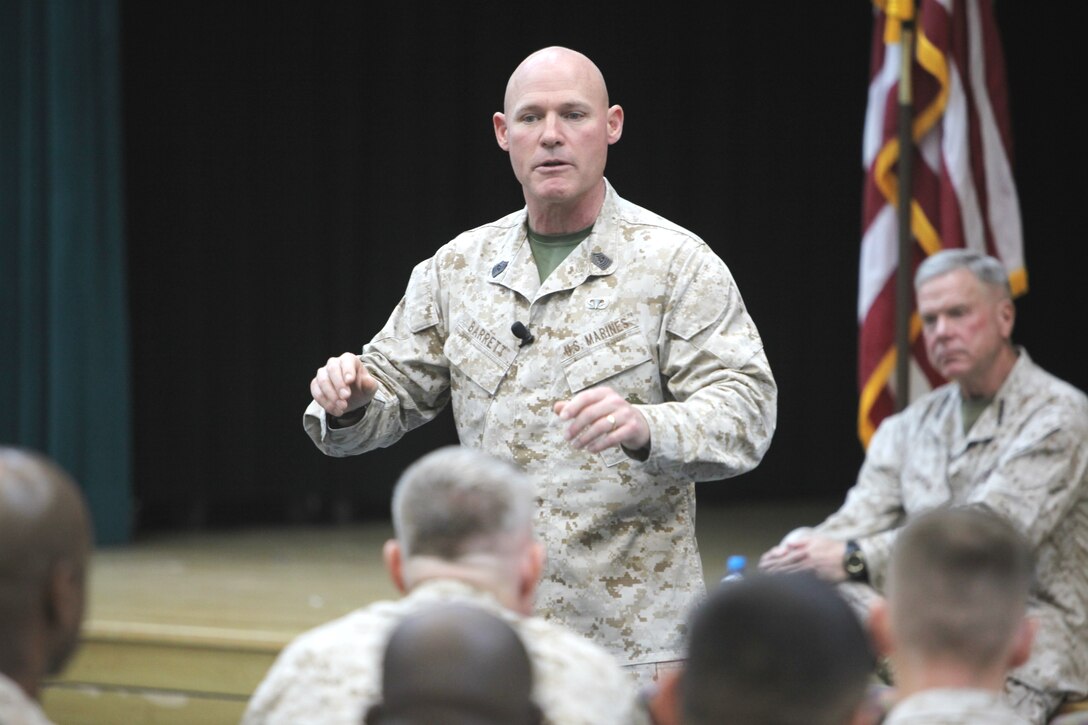 The 17th and current Sergeant Major of the Marine Corps, SgtMaj. Micheal P. Barret, addressed Marines serving in Bahrain in the Naval Support Activity Bahrain Multi-Purpose Room, Dec 27.  Barrett traveled throughout the U.S. Central Command area of responsibility with the Commandant of the Marine Corps, Gen. James F. Amos (pictured on the right), to visit Marines over the holiday season. 