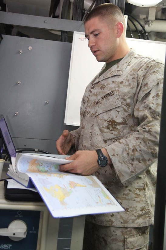 First Lt. Carter A. Dunham, fire-direction controller, 1st Platoon, Batter B, Battalion Landing Team 3/5, 15th Marine Expeditionary Unit, teaches a U.S. History class aboard the USS Rushmore, Dec. 28. Marines and sailors aboard the Rushmore use the Tuition Assistance Program to enroll in courses offered by Central Texas College and Park University. The 15th MEU is deployed as part of the Peleliu Amphibious Ready Group as a U.S. Central Command theater reserve force, providing support for maritime security operations and theater security cooperation efforts in the U.S. 5th Fleet area of responsibility. (U.S. Marine Corps photo by Cpl. Timothy R. Childers)