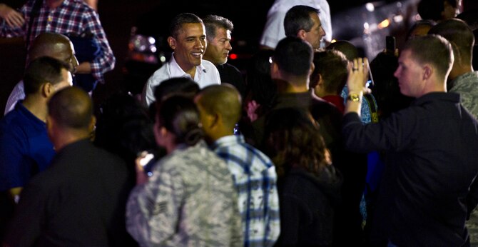 President Barack Obama is greeted by military servicemembers and their families before departing Joint Base Pearl Harbor-Hickam, Hawaii, Jan. 5, 2013. The President and his family stayed on the island as part of their annual tradition of vacationing in Oahu during the holidays. (U.S. Air Force photo/Staff Sgt. Nathan Allen) 

