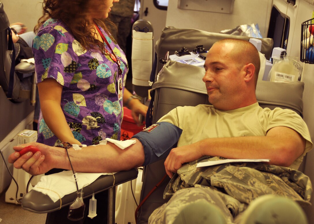 Tech. Sgt. Robert Hoeft of the 919th Aircraft Maintenance Squadron makes a donation inside the Northwest Florida Blood Services bloodmobile during the organization’s drive Jan. 4, 2013 at Duke Field, Fla.  Duke reservists donated more than 35 units during a previous blood drive held in October 2012. (U.S. Air Force photo/Dan Neely)