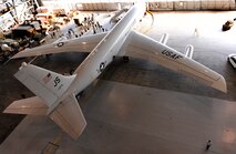 An E-8C test aircraft is displayed during a Joint Surveillance Target Attack Radar System exhibition in a hangar at Joint Base Langley-Eustis, Va., Dec. 18, 2012. Joint STARS provides wide area situational awareness and early warning for U.S. and multinational maritime task forces. (U.S. Air Force photo by Staff Sgt. Krystie Martinez/Released)