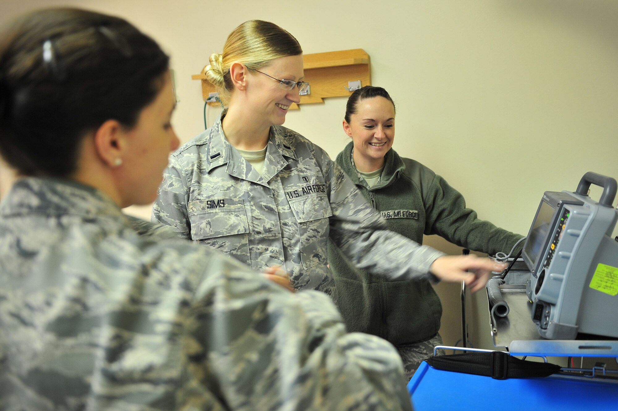 U.S. Air Force 1st Lt. Sarah Sims, 27th Special Operations Medical Group, receives refresher training on proper defibrillator use as part of the 27th Special Operations Wing Safety Day, Jan. 2, 2013. The safety day was part of an Air Force Special Operations Command initiative for all Airmen within the command. (U.S. Air Force photo/Capt. Anastasia Burgess)