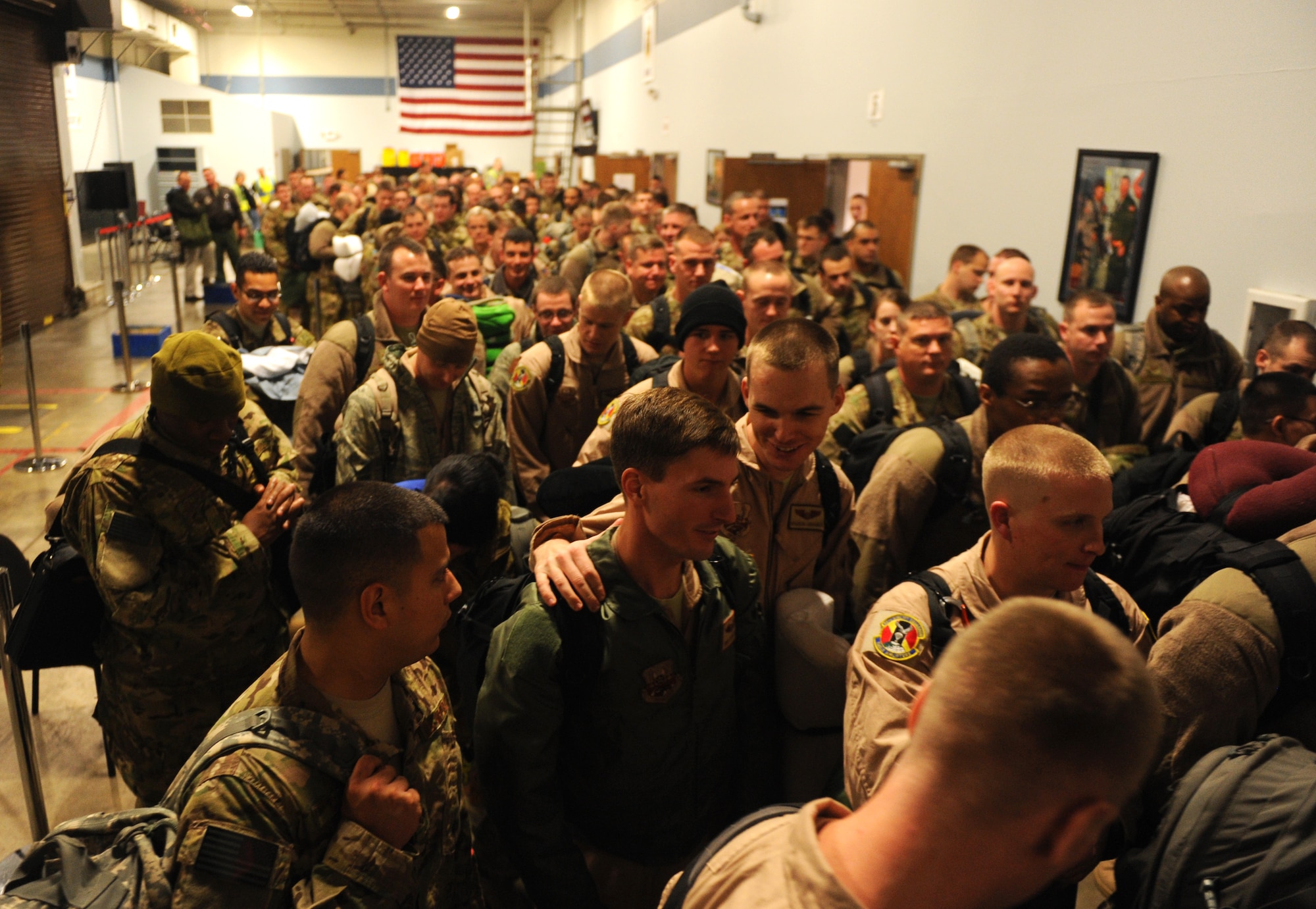 Team Little Rock members depart the deployment holding area Jan. 6, 2013, at Little Rock Air Force Base, Ark. More than one hundred seventy military members went through the processing area and deployed to Southwest Asia. (U.S. Air Force photo by Airman First Class Ethan Dunagan)