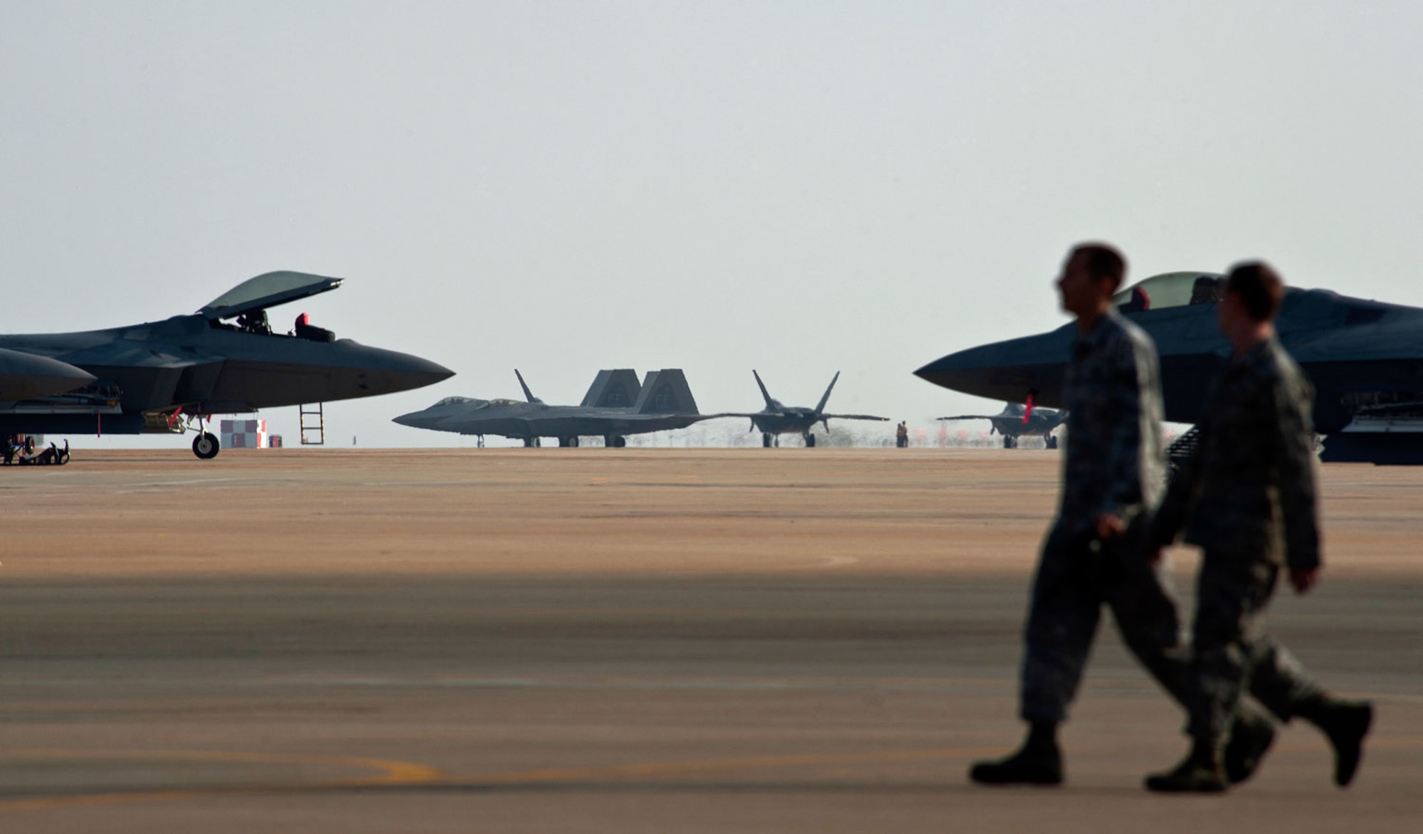 F-22 Raptors are prepared for training missions on the flightline at Joint Base Langley-Eustis, Va. (U.S. Air Force photo/Tech. Sgt. Bennie J. Davis III)
