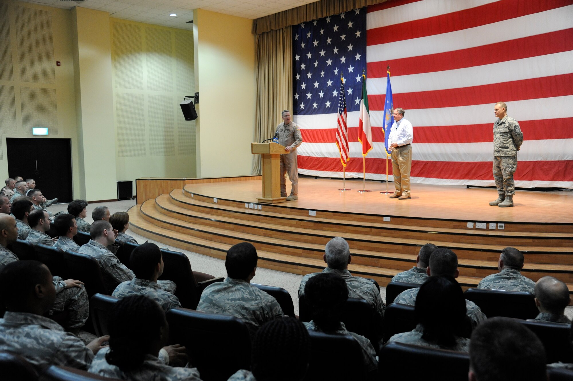 Col. Shawn Farrow, 386th Air Expeditionary Wing commander, introduces Secretary of the Air Force Michael Donley and Chief Master Sgt. of the Air Force James Roy during an Airman’s Call at the wing Dec. 30, 2012.  Donley and Roy visited the wing as part of a multi-base tour in the U.S. Air Forces Central Command area of responsibility.  (U.S. Air Force photo by Staff Sgt. Austin Knox)