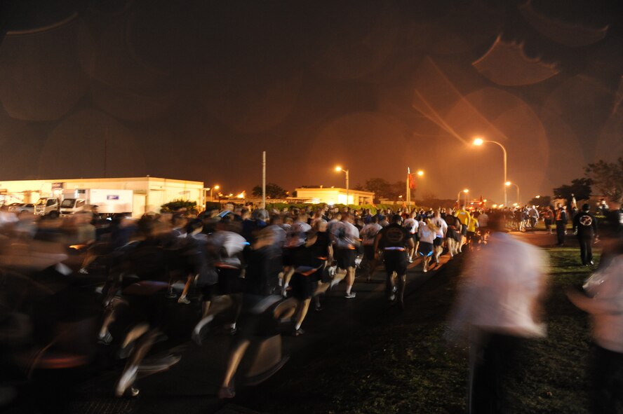 Military members and their families run in remembrance of the Sandy Hook Elementary school victims on Kadena Air Base, Japan, Jan. 4, 2013. All the money raised from the runners donations will be given to the Sandy Hook Elementary School. (U.S. Air Force photo/ Airman 1st Class Brooke P. Doyle)