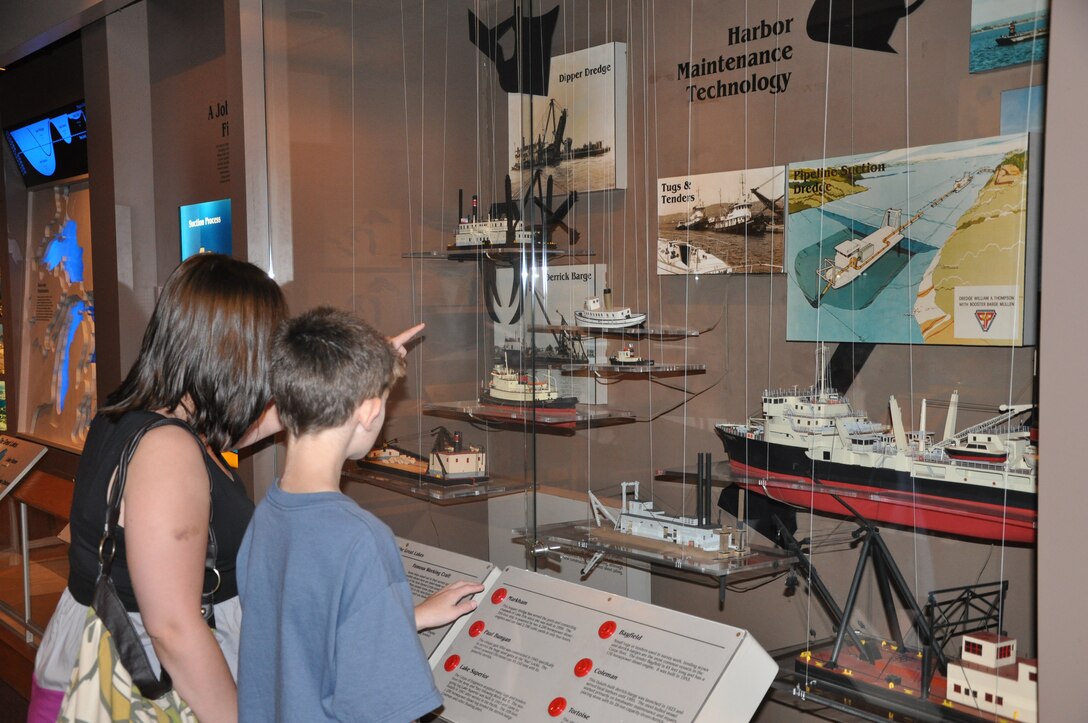 Visitors to the Lake Superior Maritime Visitor Center in Duluth, Minn., view an educational display on Great Lakes ships.