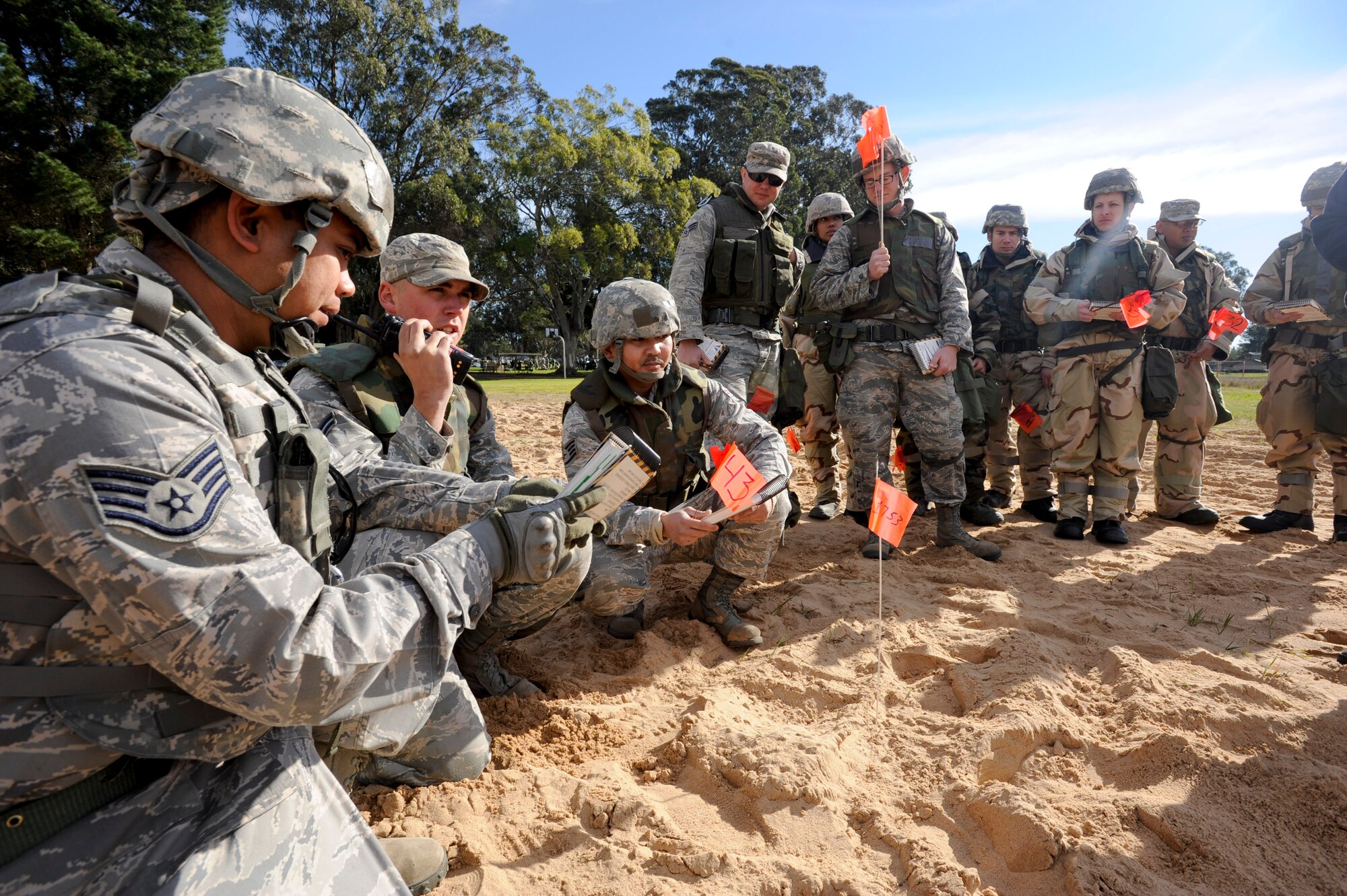 VANDENBERG AIR FORCE BASE, Calif. -- Vandenberg Airmen call in a suspected Unexploded Ordinance during a practice for a Northstar exercise here Monday, Jan. 7, 2013. The Northstar exercise is designed to test the deployment capabilities and combat survival skills of Vandenberg Airmen. (U.S. Air Force photo/Airman Yvonne Morales)
