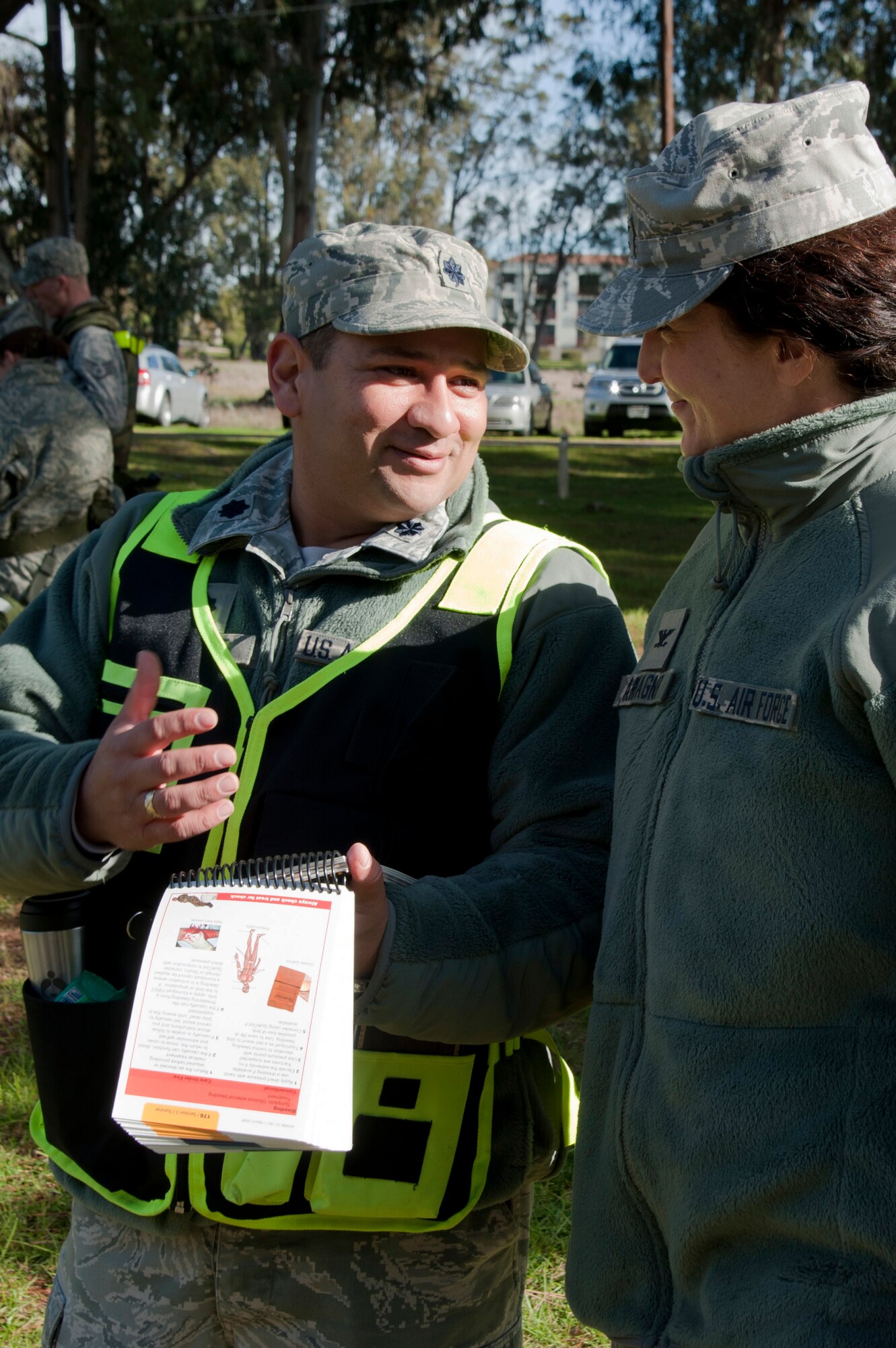 VANDENBERG AIR FORCE BASE, Calif. --  Col. Nina Armagno, 30th Space Wing commander, speaks with Lt. Col. Nicholas Petrone, 30th Medical Support Squadron chief nurse,  about the Self-Aid and Buddy Care training stations for the Northstar exercise participants here at Cocheo Park, Monday, Jan. 7, 2013. The Northstar exercise is designed to test the deployment capabilities and combat survival skills of Vandenberg Airmen. (U.S. Air Force photo/Senior Airman Lael Huss)
