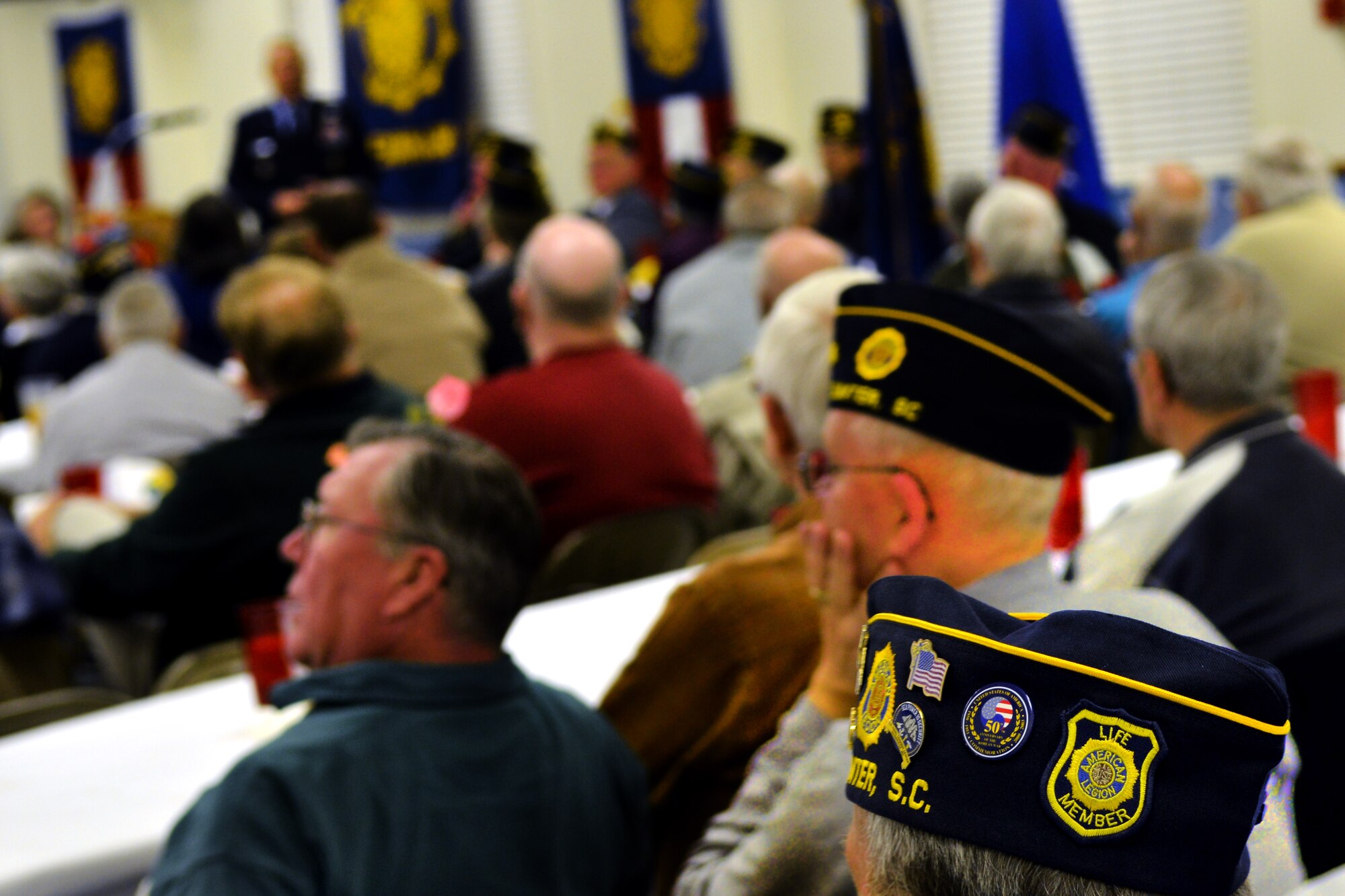 Members of the American Legion all gather for their weekly meeting with their guest 
speaker Maj. Gen. Lawrence Wells, 9th Air Force commander, while proudly wearing their member caps, Sumter, S.C., Jan. 7, 2013. American Legion Post 15 has more than 800 members. (U.S. Air Force photo by Airman 1st Class Ashley L. Gardner/ Released)
