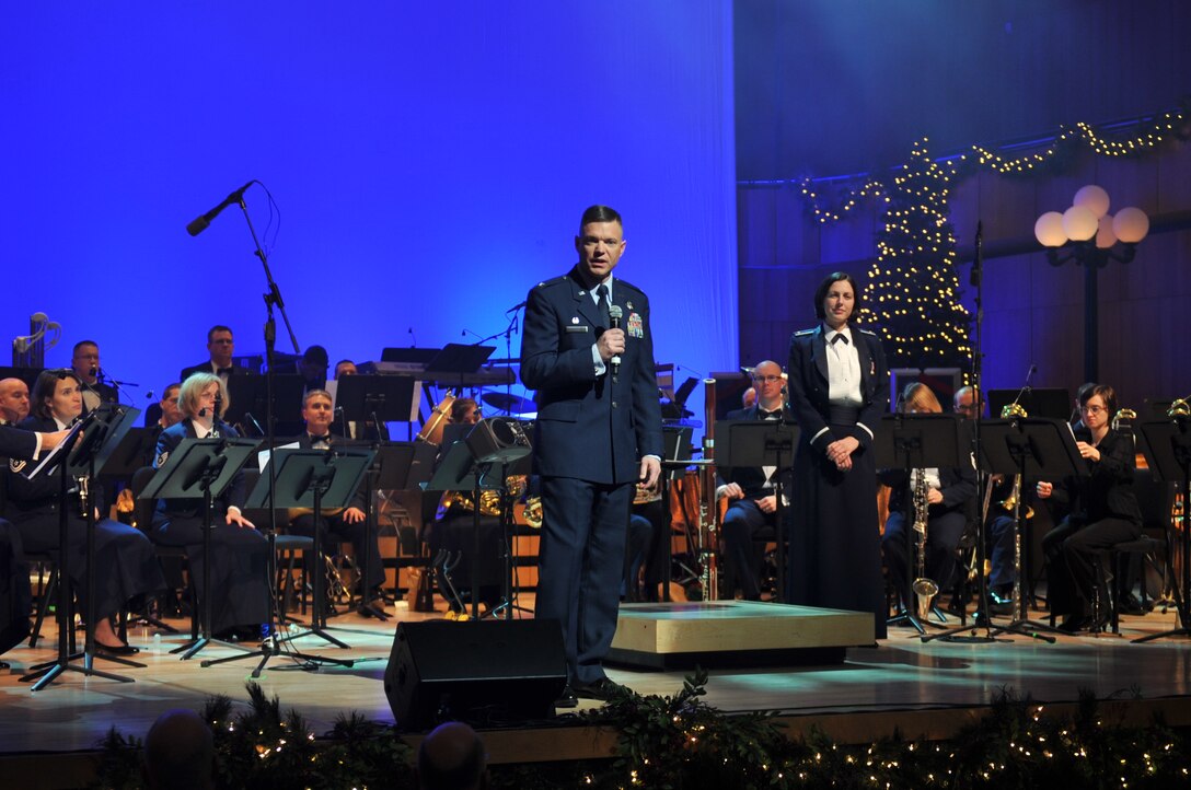 55th Wing Commander Col. John T. Rauch addresses the audience at "A Hometown Holiday"