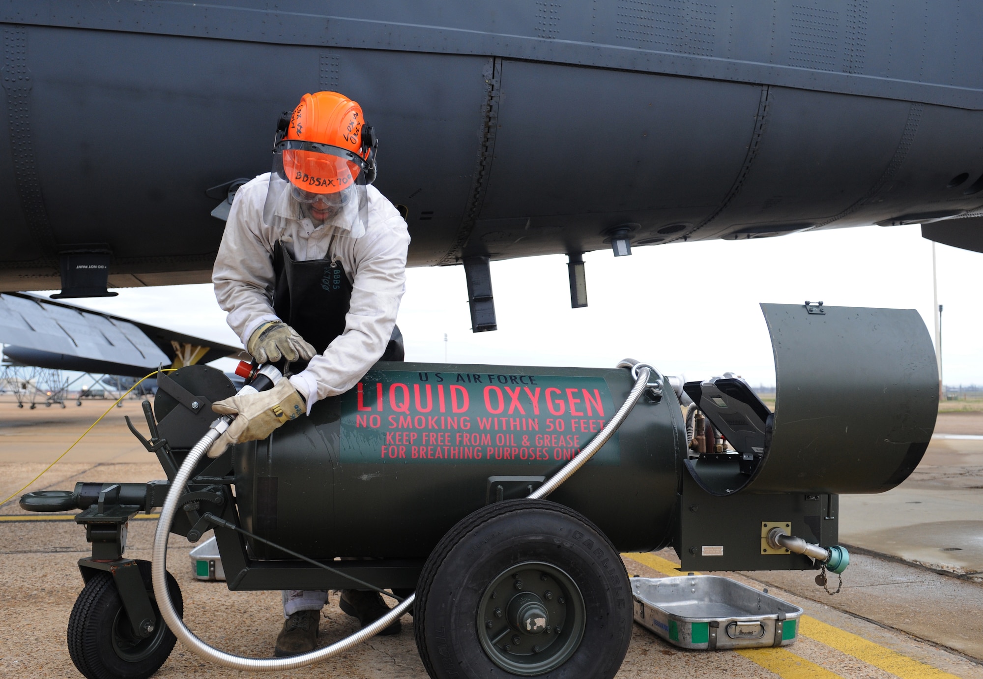 Senior Airman Princeton Drake, 20th Aircraft Maintenance Unit crew chief, prepares a liquid oxygen servicing hose on Barksdale Air Force Base, La., Jan. 8. The B-52 is required to have more than 30 liters of liquid oxygen onboard and is used as breathing oxygen for the aircrew during flight. (U.S. Air Force photo/Airman 1st Class Benjamin Gonsier)
