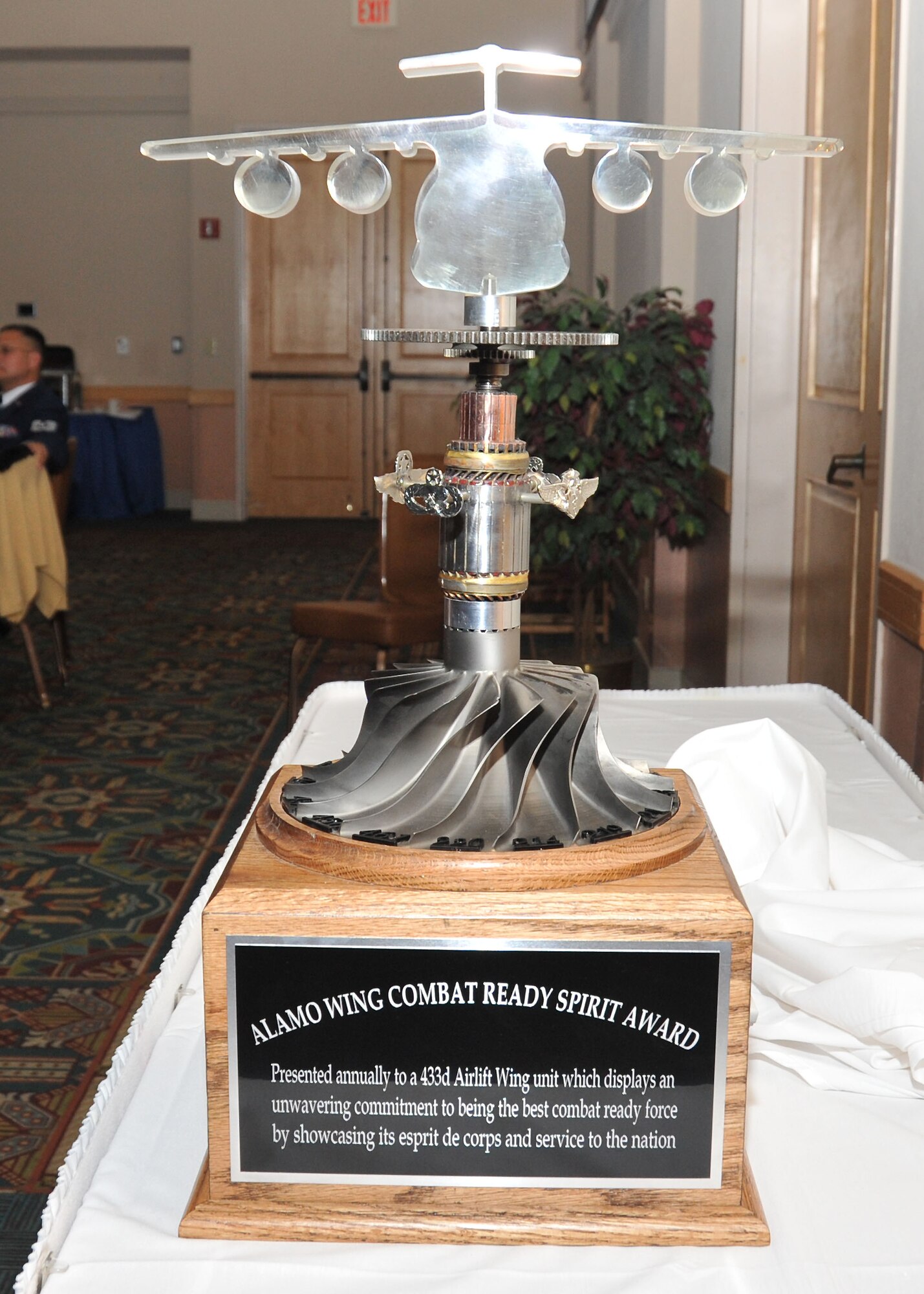 The inaugural 433rd Airlift Wing Combat Ready Spirit was presented at the wing's second annual awards banquet, held on Sat., Jan. 5.  The award is a unique design of an actual C-5 Galaxy turbine, rotor and other assorted, discarded C-5 parts.  Wing senior leadership presented the honor to the winning three-to-four video that portrayed the unit's spirit, pride, actions, and commitment to the wing's mission of providing combat-ready forces. The 433rd Aeromedical Evacuation Squadron was presented with the trophy during the banquet.
