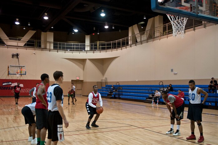 An Airman from the 563rd Operational Support Squadron prepares to shoot a free-throw after being fouled in a game against the 757th Aircraft Maintenance Squadron, Jan. 7, 2013, in the Warrior Fitness Center at Nellis Air Force Base, Nev. The 757th AMXS won the game 57-55, and begins the season with a 1-0 record. (U.S. Air Force Photo by Senior Airman Daniel Hughes)
