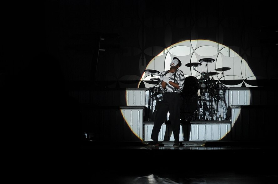 A mime performs during a Tops in Blue concert on Seymour Johnson Air Force Base, N.C., Jan. 7, 2013. Airmen from across the Air Force compete to be a part of the Tops in Blue performance for a year. The group featured songs from artists such as Michael Jackson, Whitney Houston and Maroon 5. (U.S. Air Force photo/Airman 1st Class Mariah Tolbert/Released)