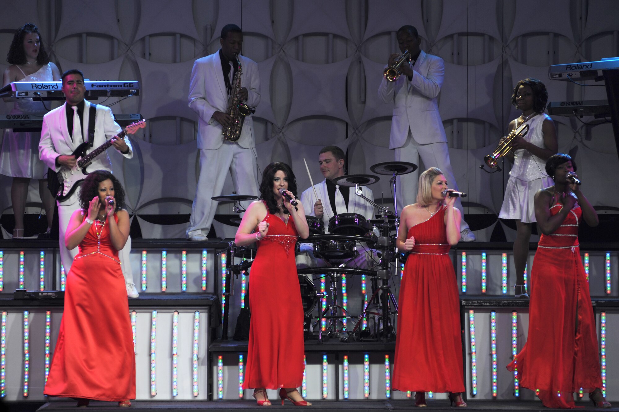 Vocalists from Tops in Blue, showcase their talents to Airmen and base personnel on Seymour Johnson Air Force Base, N.C., Jan. 7, 2013. Each year Air Force personnel compete in multilevel competition for the chance to be a Tops in Blue member. Once selected for the team Airmen leave their duty stations for a year to be a part of the group. (U.S. Air Force photo/Airman 1st Class Mariah Tolbert/Released)