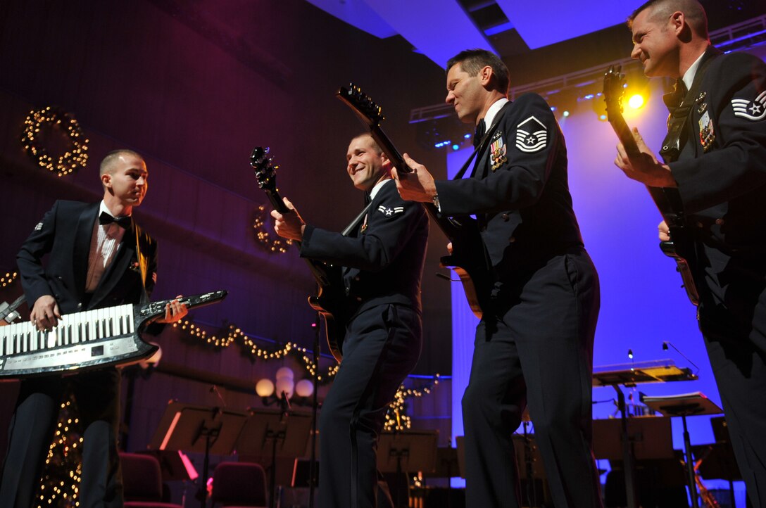 Night Wing's Senior Airman Ryan Rager, Airman First Class Lee Heerspink, Master Sergeant Rick Baisden and Staff Sergeant Dan Bragdon perform "A Christmas Rock Medley"