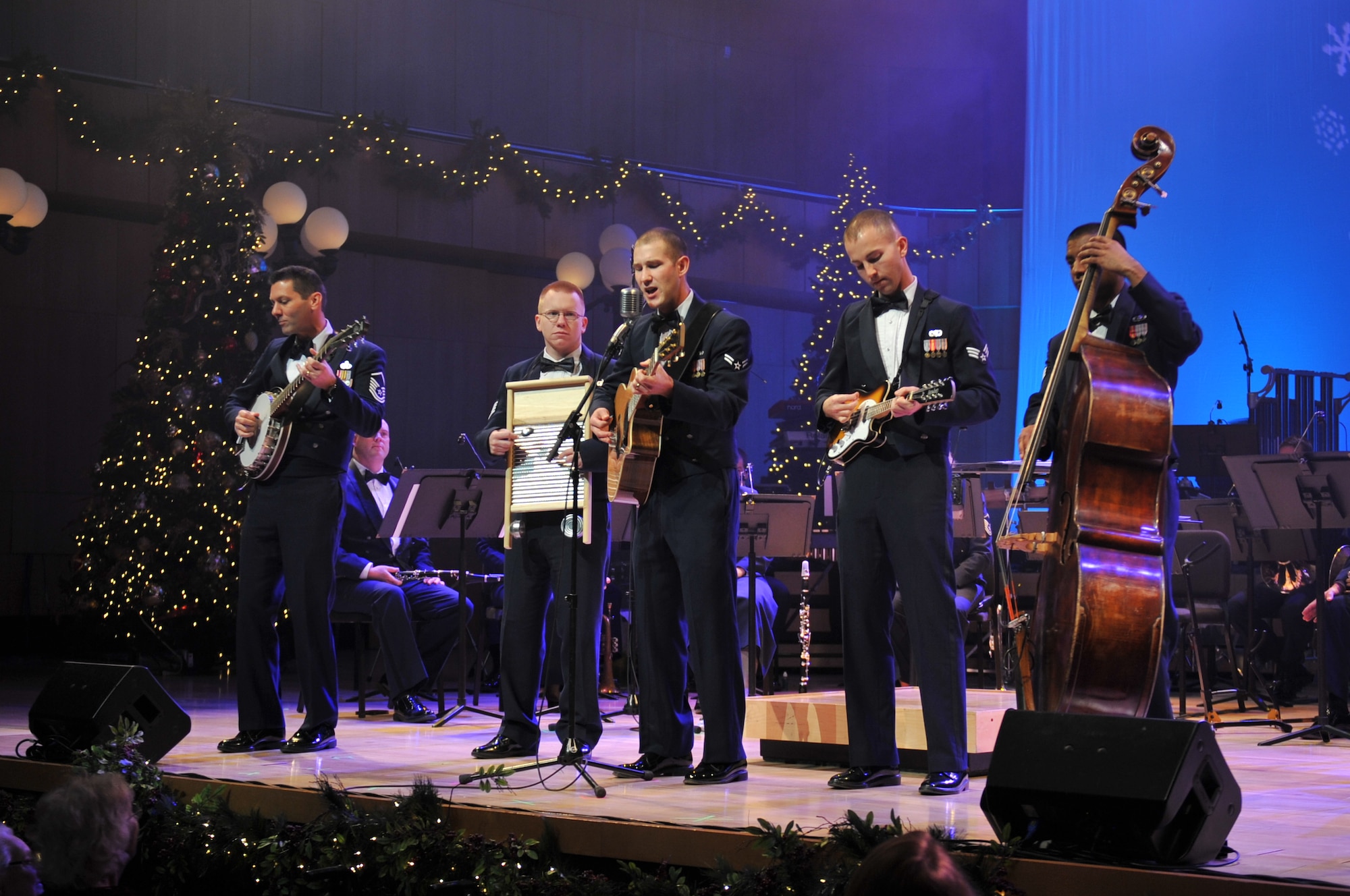Night Wing's Master Sergeant Rick Baisden, Staff Sergeant Dave Pojar, Airman First Class Lee Heerspink, Senior Airman Ryan Rager, and Senior Airman Ryan Persaud perform "Winter Wonderland"