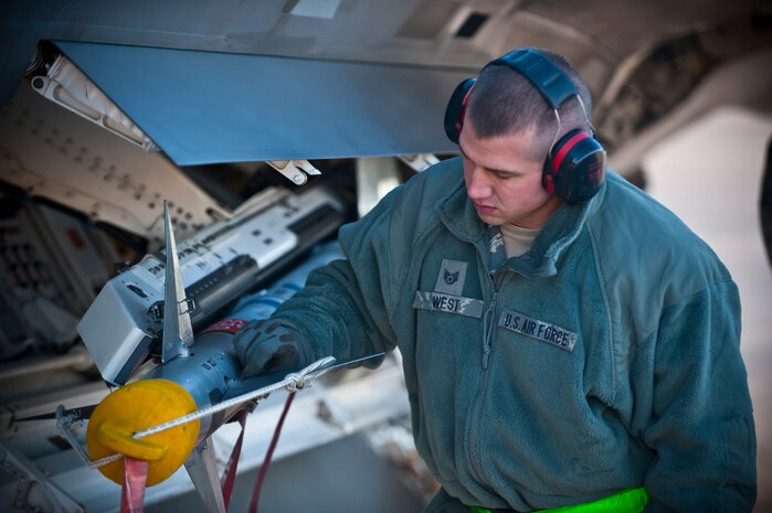 Staff Sgt. Daniel West, 57th Aircraft Maintenance Squadron aircraft armament systems technician, checks an AIM-9 Sidewinder air-to-air missile during a quarterly load crew competition, Jan. 4, 2013, at Nellis Air Force Base, Nev. Airmen were tasked to upload munitions to two F-16 Fighting Falcons, three F-15 Eagles, one F22 Raptor, and one A-10 Warthog. (U.S. Air Force Photo by Airman 1st Class Jason Couillard)