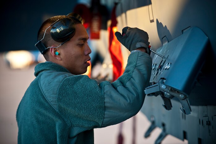 Senior Airman Armin Eusebio, 757th Aircraft Maintenance Squadron aircraft armament systems technician, prepares to upload a guided bomb unit on an F-15 Eagle during the quarterly load crew competition, Jan. 4, 2013, at Nellis Air Force Base, Nev. Weapons load competitions are conducted quarterly to keep Airmen sharp and recognize superior performers. (U.S. Air Force Photo by Airman 1st Class Jason Couillard) 
