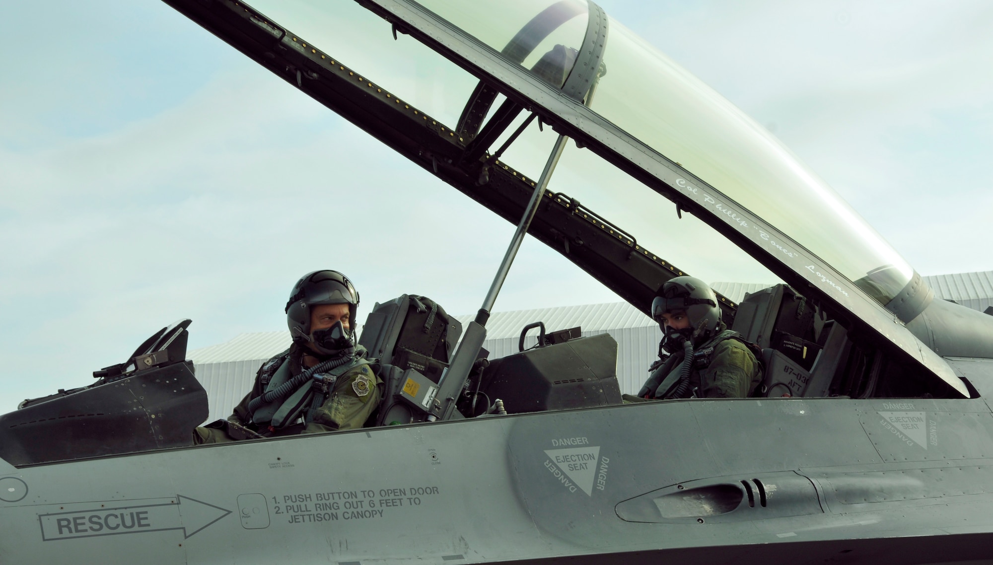 Lt. Col. Adam Meyers (left), 93rd FS F-16 pilot, gives pre-flight instructions to Air Force Academy Cadet Patrick Lobo before takeoff for Lobo's F-16 orientation flight at Homestead Air Reserve Base, Fla., Dec. 21. Six Air Force Academy cadets, during their winter break, participated in orientation flights, flying in the backseat of an F-16 with pilots from the 93rd Fighter Squadron at Homestead Air Reserve Base, Fla., Dec. 17 through 21. Academy cadets are authorized an opportunity to ride on certain aircraft, Air Force wide, during a regularly scheduled training mission as a way of familiarizing them with the occupational Air Force. (U.S. Air Force photo/Senior Airman Jaimi Upthegrove)
