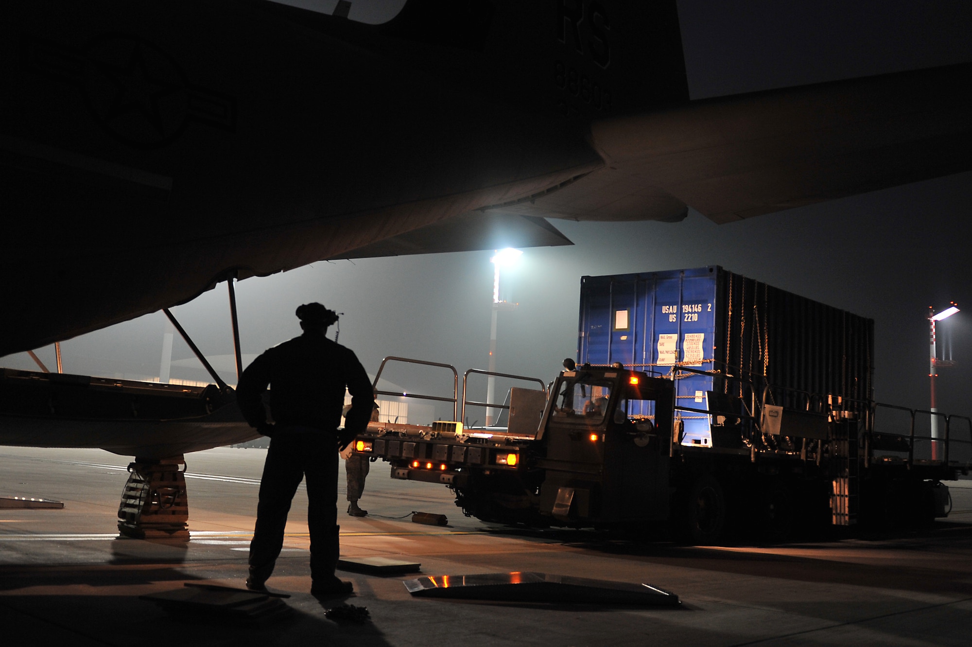 Members of the 86th Aircraft Maintenance Squadron and the 37th Airlift Squadron help load cargo onto a C-130J Super Hercules on the flightline at Ramstein Air Base, Germany, Jan. 7, 2013. The 86th Airlift Wing provides support to the NATO led coalition that will augment Turkey's air defense capabilities and contribute to the de-escalation of the crisis along the border. (U.S. Air Force photo/Airman 1st Class Holly Cook)