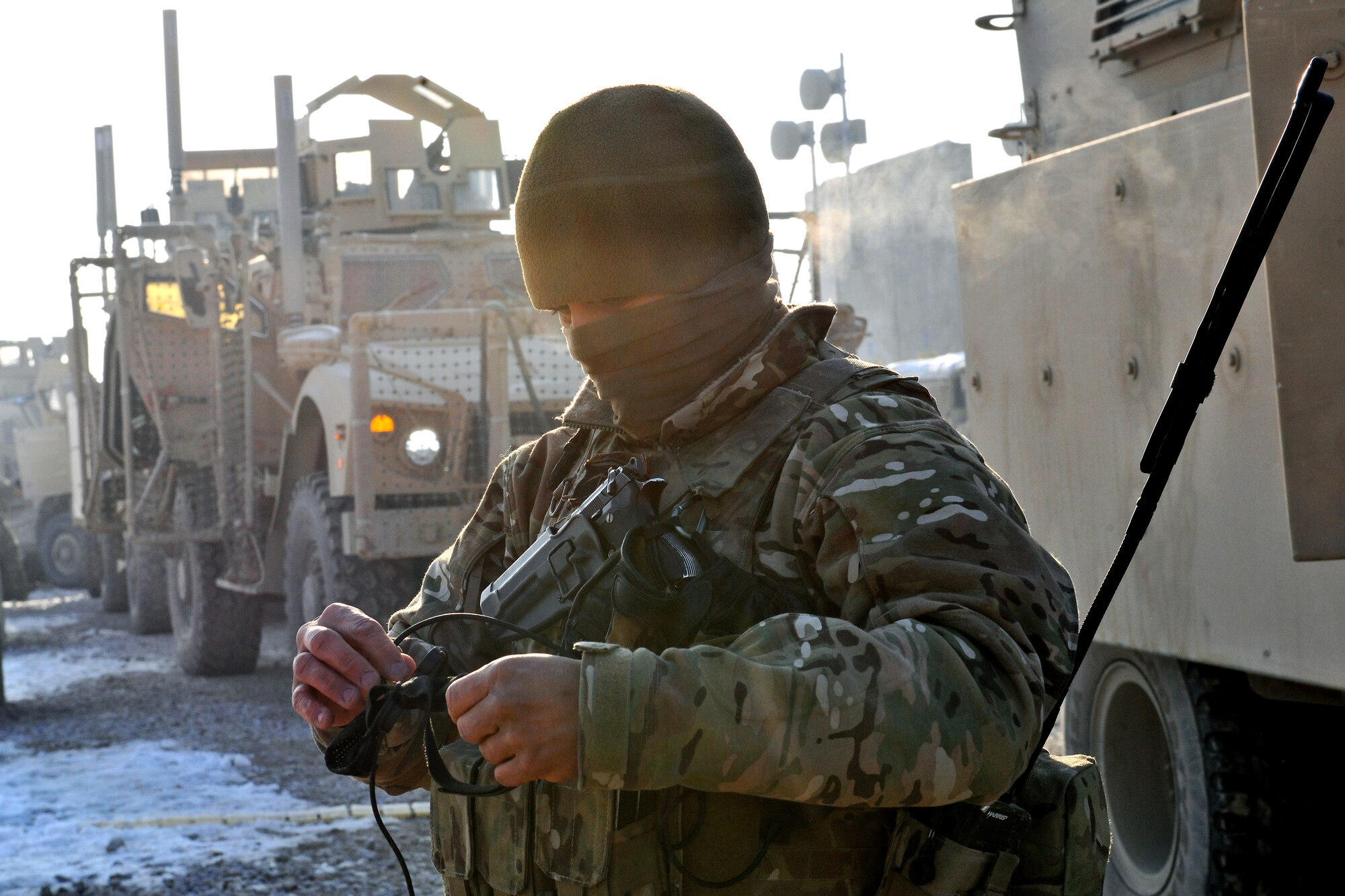 Staff Sgt. Flavio Martinez, 755th Expeditionary Security Forces Squadron, checks his gear prior to heading out on an early morning mission “outside the wire” with Reaper Team 1 at Bagram Airfield, Afghanistan, Jan. 1, 2013. The Reaper teams perform various security patrols both on and off the installation. (U.S. Air Force photo/Senior Airman Chris Willis)