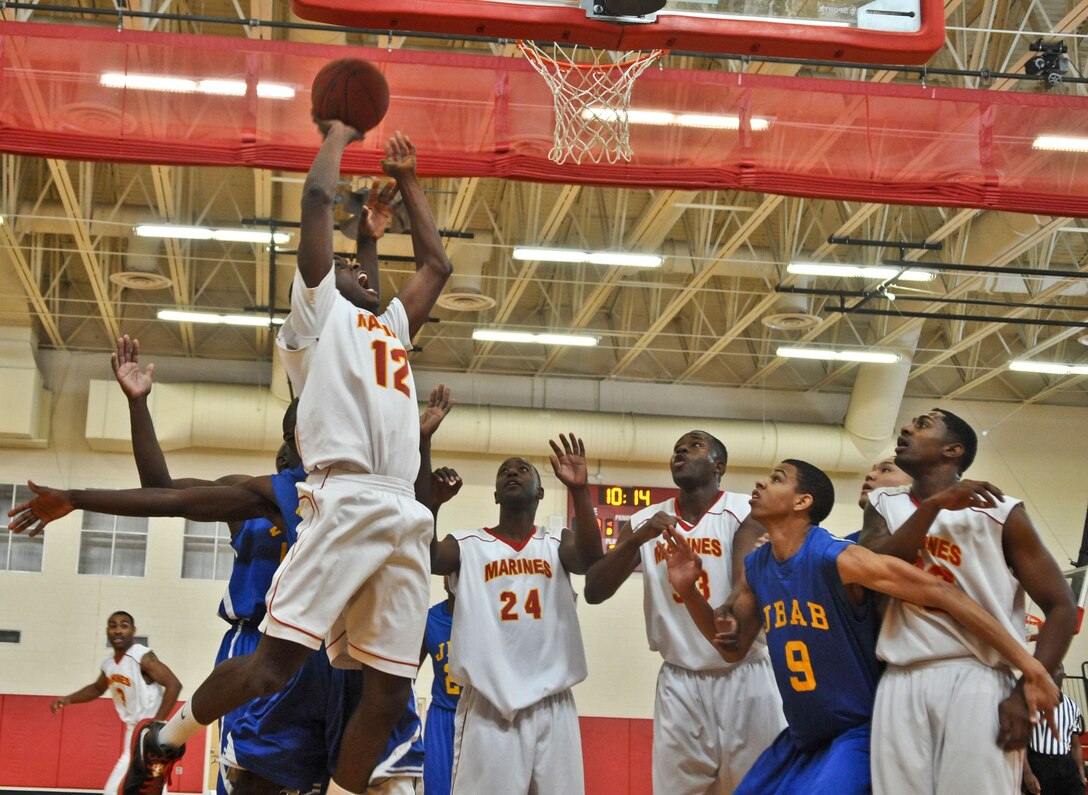 Prentice Meadows, player for the Quantico Bulldogs Men’s Varsity Basketball Team, goes for a layup during the season opener against Joint Base Anacostia at Barber Physical Activity Center on Jan. 5. In the first half of the game, the Bulldogs’ defense made them a force to be reckoned with as they went into halftime leading, 32-28. 