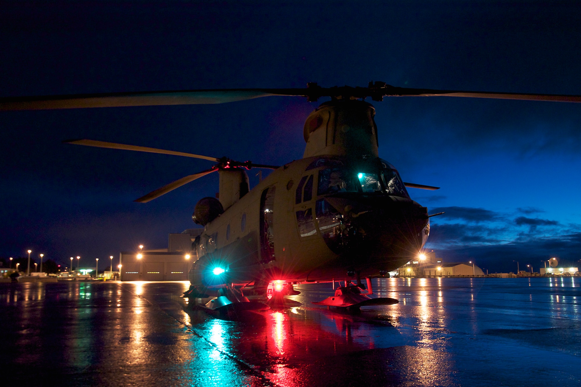 One of the two CH-47F Chinook helicopters from B Company, 1st Battalion, 52nd Aviation Regiment that flew to Kodiak on a mission to help the grounded oil rig Kulluk by hauling equipment to and from the rig sits on the tarmac Jan. 7. (U.S. Air Force photo/Staff Sgt. Aaron M. Johnson)