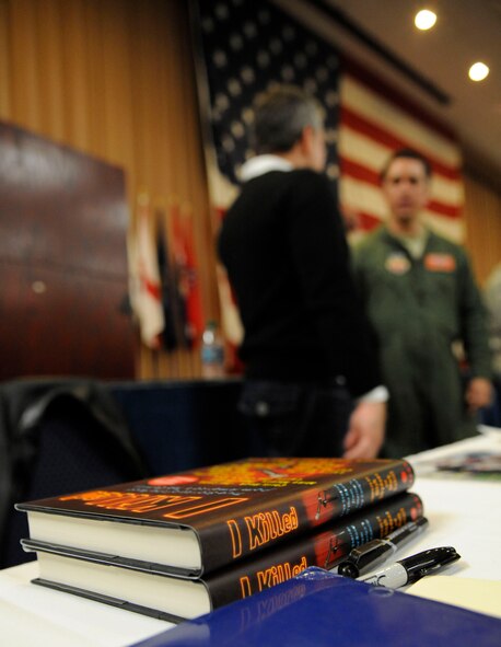 Comedian Bernie McGrenahan, from the "Happy Hour" comedy tour, talks with Airmen after the 2nd Bomb Wing's annual refocus day in Hoban Hall on Barksdale Air Force, La., Jan. 4. McGrenahan spoke with service members about his past with substance abuse and his family as part of a non-traditional resiliency training opportunity. (U.S. Air Force photo/Senior Airman Kristin High) 
