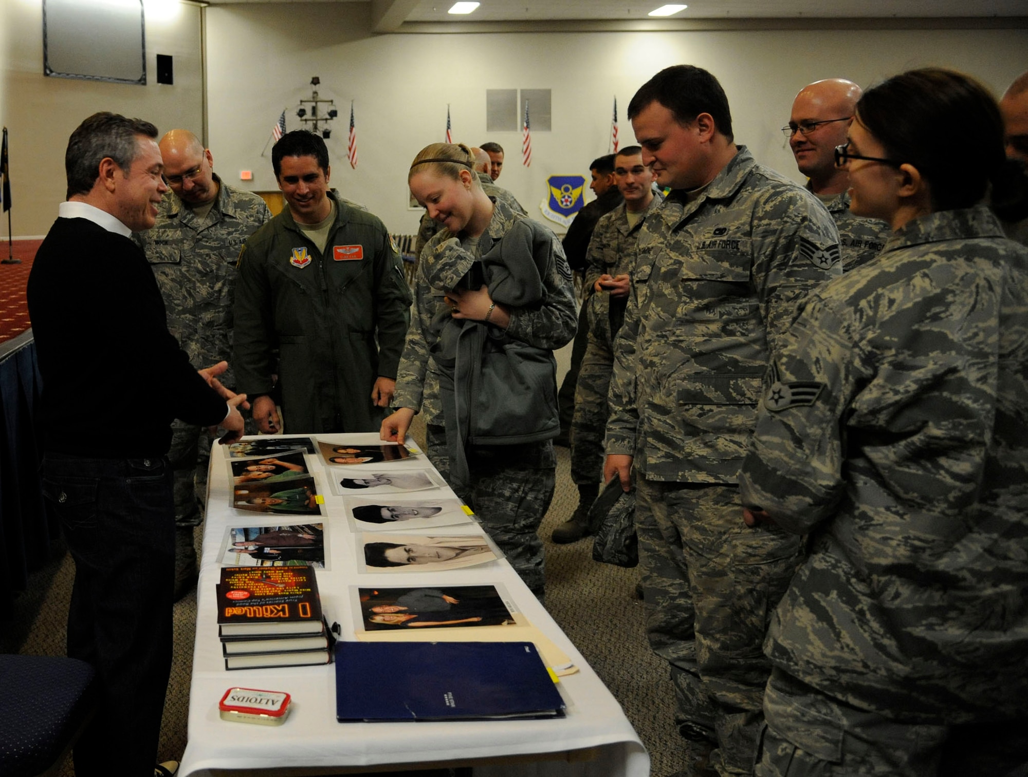 Comedian Bernie McGrenahan, from the "Happy Hour" comedy tour, talks with Airmen after the 2nd Bomb Wing's annual refocus day in Hoban Hall on Barksdale Air Force, La., Jan. 4. McGrenahan spoke with service members about his past with substance abuse and his family as part of a non-traditional resiliency training opportunity. (U.S. Air Force photo/Senior Airman Kristin High) 
