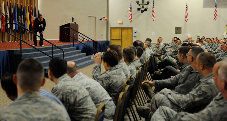 As part of the 2nd Bomb Wing's annual refocus day, comedian Bernie McGrenahan from the "Happy Hour" comedy tour, jokes with Barksdale Airmen in Hoban Hall on Barksdale Air Force, La., Jan. 4. McGrenahan also spoke about his past with substance abuse. The refocus day brought Team Barksdale together after the holidays to give them a strong safety message about resiliency to kick off the New Year. (U.S. Air Force photo/Senior Airman Kristin High)