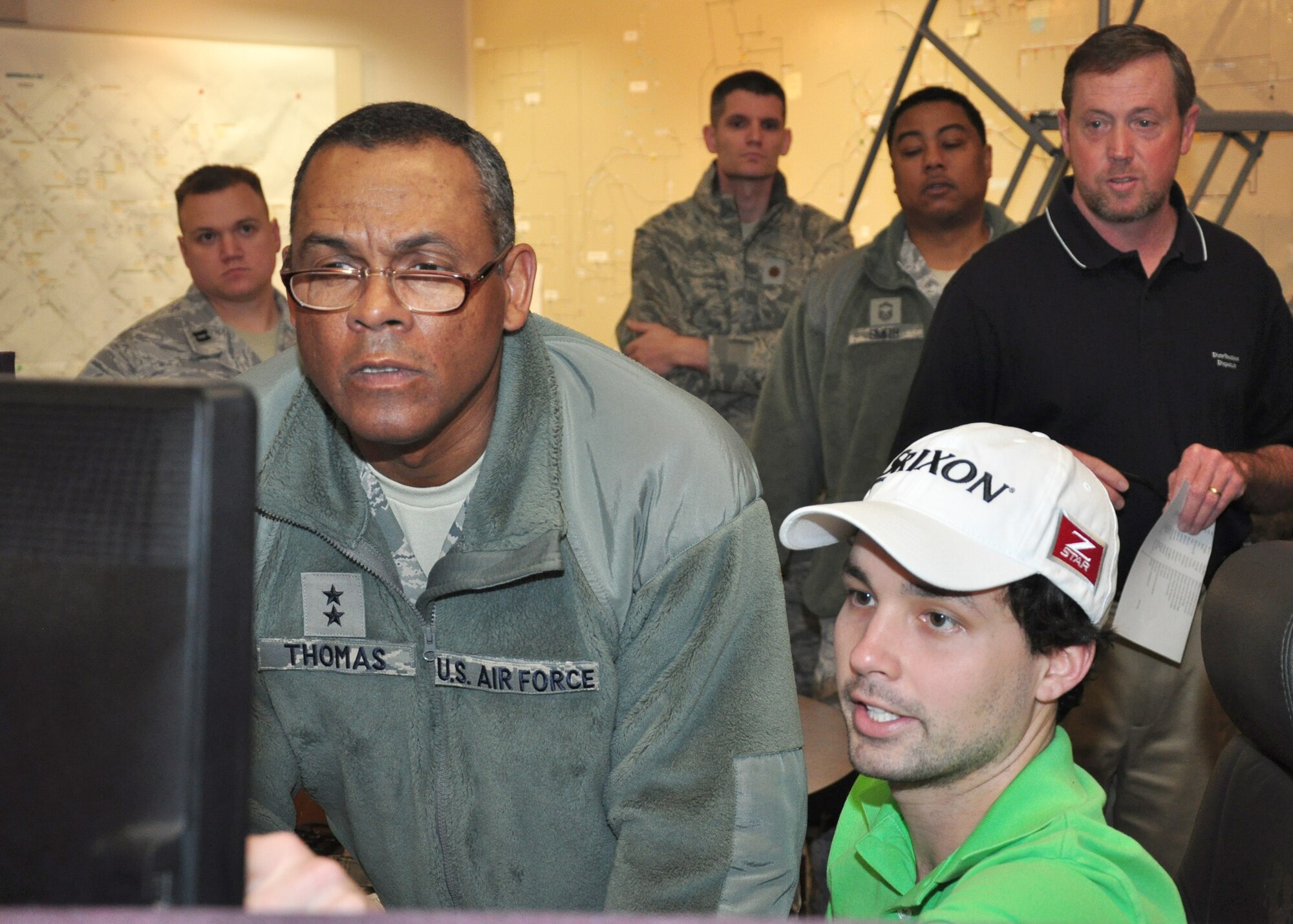 An employee at the Southwestern Electrical Power Company’s Arsenal Hill Power Plant in Shreveport explains the company’s Supervisory Control and Data Acquisition system to Maj. Gen. Everett Thomas, vice commander of Air Force Global Strike Command. The AFGSC Environmental Management Steering Group and the Red River Post of the Society of American Military Engineers toured SWEPCO’s Arsenal Hill Power Plant in Shreveport, La., Jan. 8. (U.S. Air Force Photo/Carla Pampe)