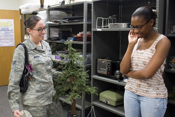 Senior Airman Alicia Rivera (left) and Senior Airman Alayna Reese (right), 45th Comptroller Squadron, visit Airman’s Attic. Airman’s Attic is open Monday through Friday from 9 a.m. to 3 p.m. (U.S. Air Force photo/ Matthew Jurgens) 
