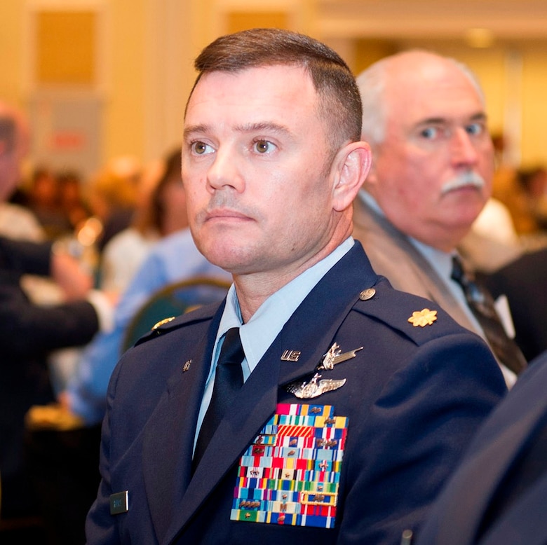 The first annual Forrest S. McCartney National Defense Space Award was presented to Maj. Kenneth Holmes, Air Force Special Operations Command, chief of space training, at the National Space Club luncheon Tuesday. (U.S. Air Force photo/ Cory Long)