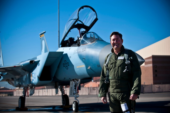 Mr. Scott Gragson, 57th Adversary Tactics Group honorary commander, stands in front of an F-15 Eagle before an orientation flight Jan. 4th, 2012, at Nellis Air Force Base, Nev. Gragson visited Nellis to learn the mission set and capabilities of the 57 ATG. (U.S. Air Force photo by Senior Airman Brett Clashman)