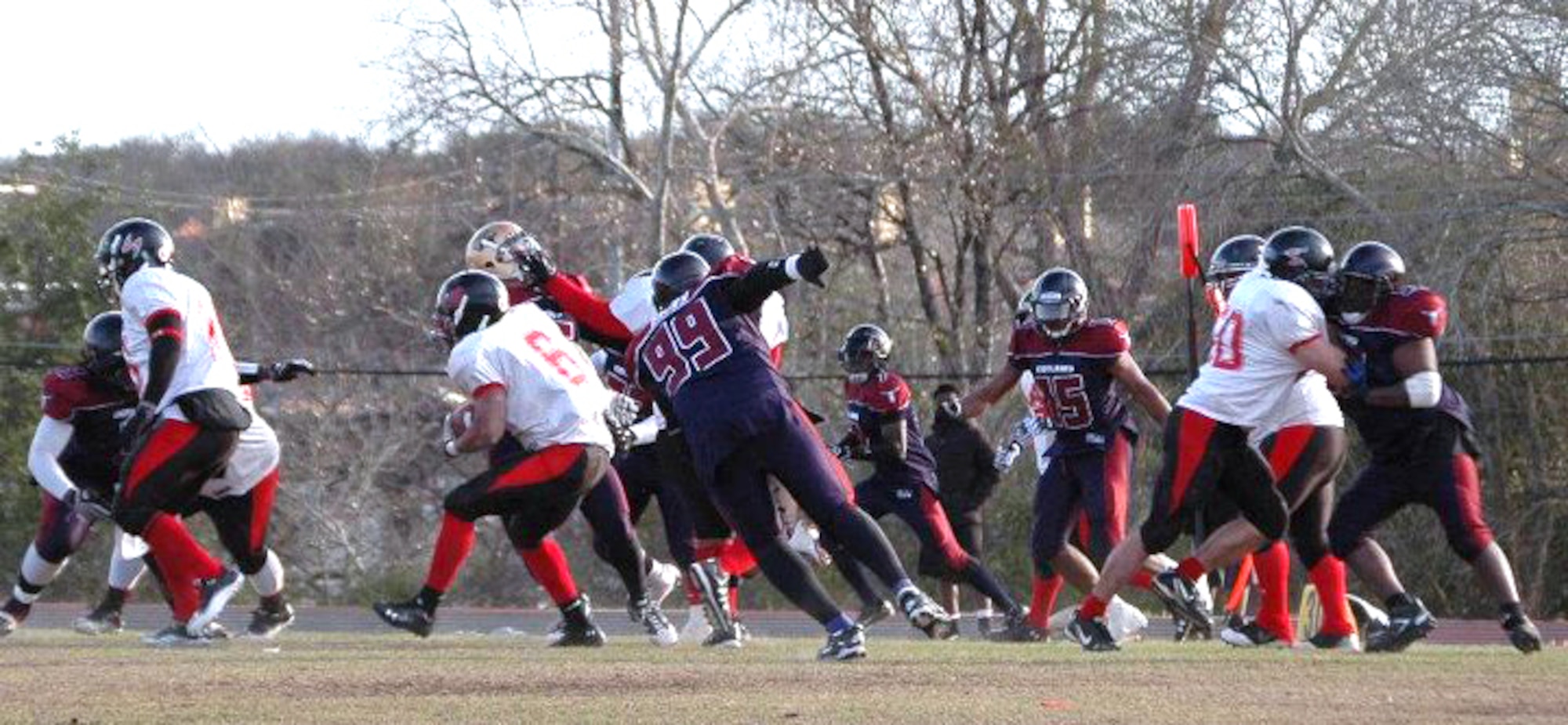 GOODFELLOW AIR FORCE BASE, Texas--Senior Airman Clifton Gathers, jersey number six, of the 17th Comptroller Squadron, demonstrates his skill on the field, during a game versus the Central Texas Outlaws, an Austin based semi-professional football team. (Courtesy photo)