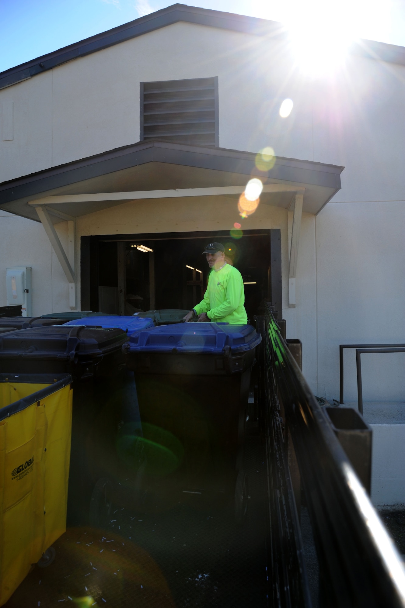 Pete Robertson, recycling center contractor, rolls cans of recycled materials from around the base into the recycling center for processing. Keesler’s recycling center recently won the Environmental Hero Award, Recycler of the Year in the state and federal government category from the Mississippi Recycling Coalition. In fiscal year 2012, the center recycled 2,383 tons of materials including 323.45 tons of food waste, a unique effort in south Mississippi. This effort saved $99,555.44 from going to landfills and resulted in $180,119 of revenue being returned to the base. (U.S. Air Force photo by Kemberly Groue
