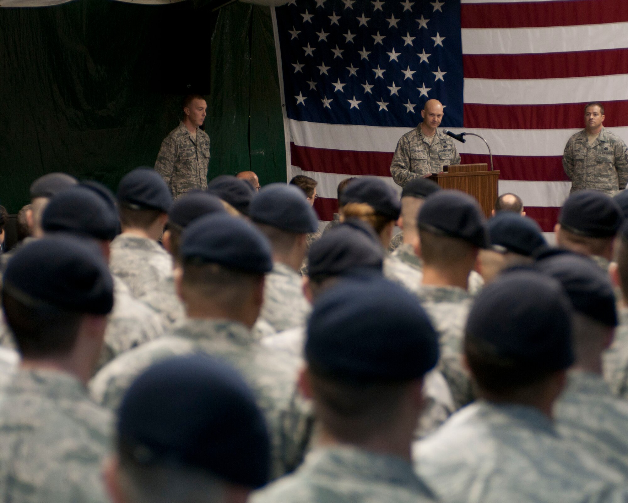 Capt. Christian Leighton addresses the crowd during his assumption of command ceremony on Otis Air National Guard Base Dec. 2. Leighton assumed command of the 102nd Security Forces Squadron, which he was once a member of as an enlisted Airman. (Air National Guard photo by Senior Airman Patrick McKenna/Released)