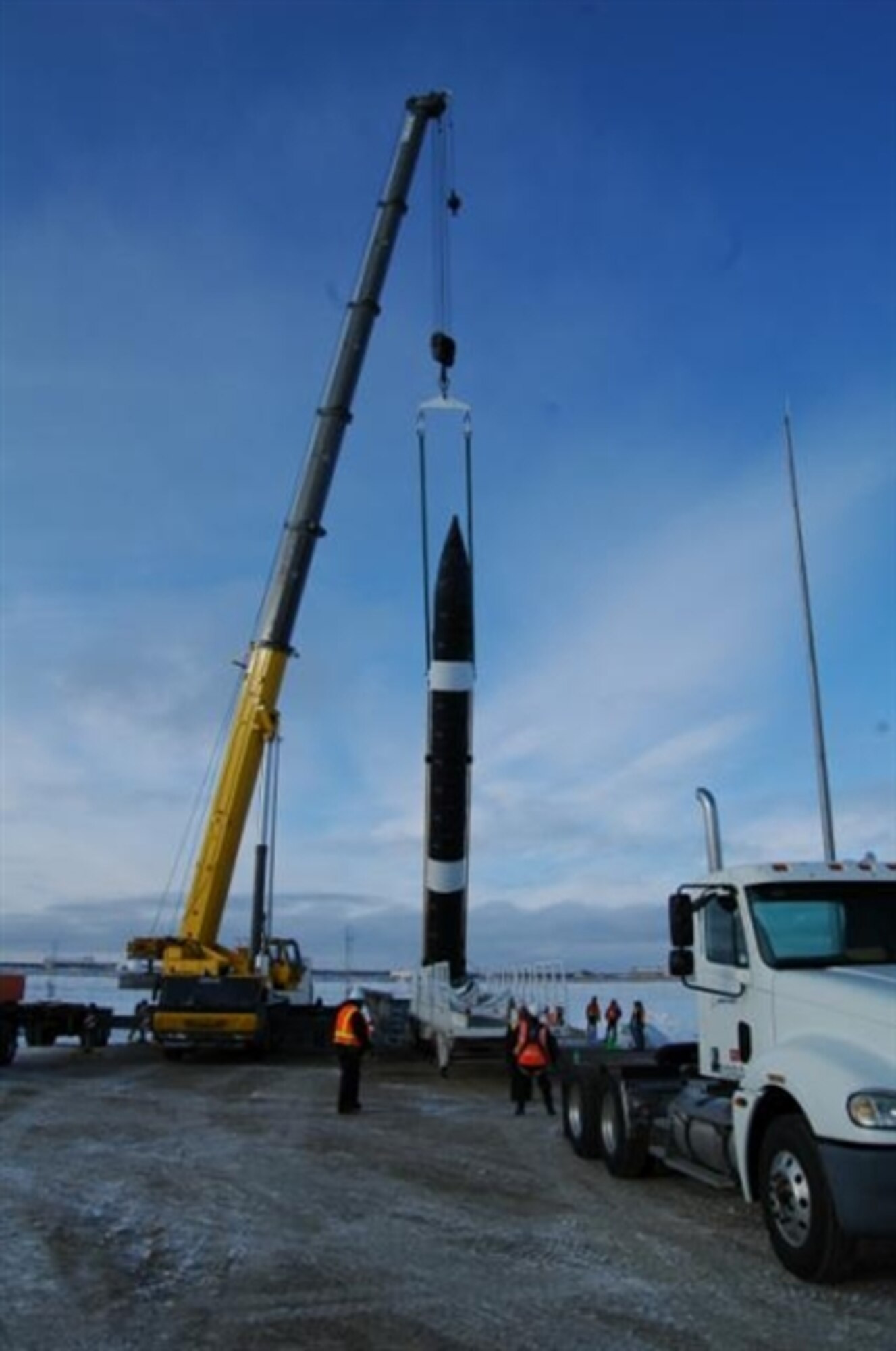 Technicians prepare a ground based Interceptor for emplacement into Missile Field 2 at the Missile Defense Complex at Fort Greely, Alaska, Feb. 25, 2012. U.S. Northern Command is collaborating closely with the Missile Defense Agency to improve the capability of systems designed to counter threats to the homeland. Missile Defense Agency photo by Ralph Scott