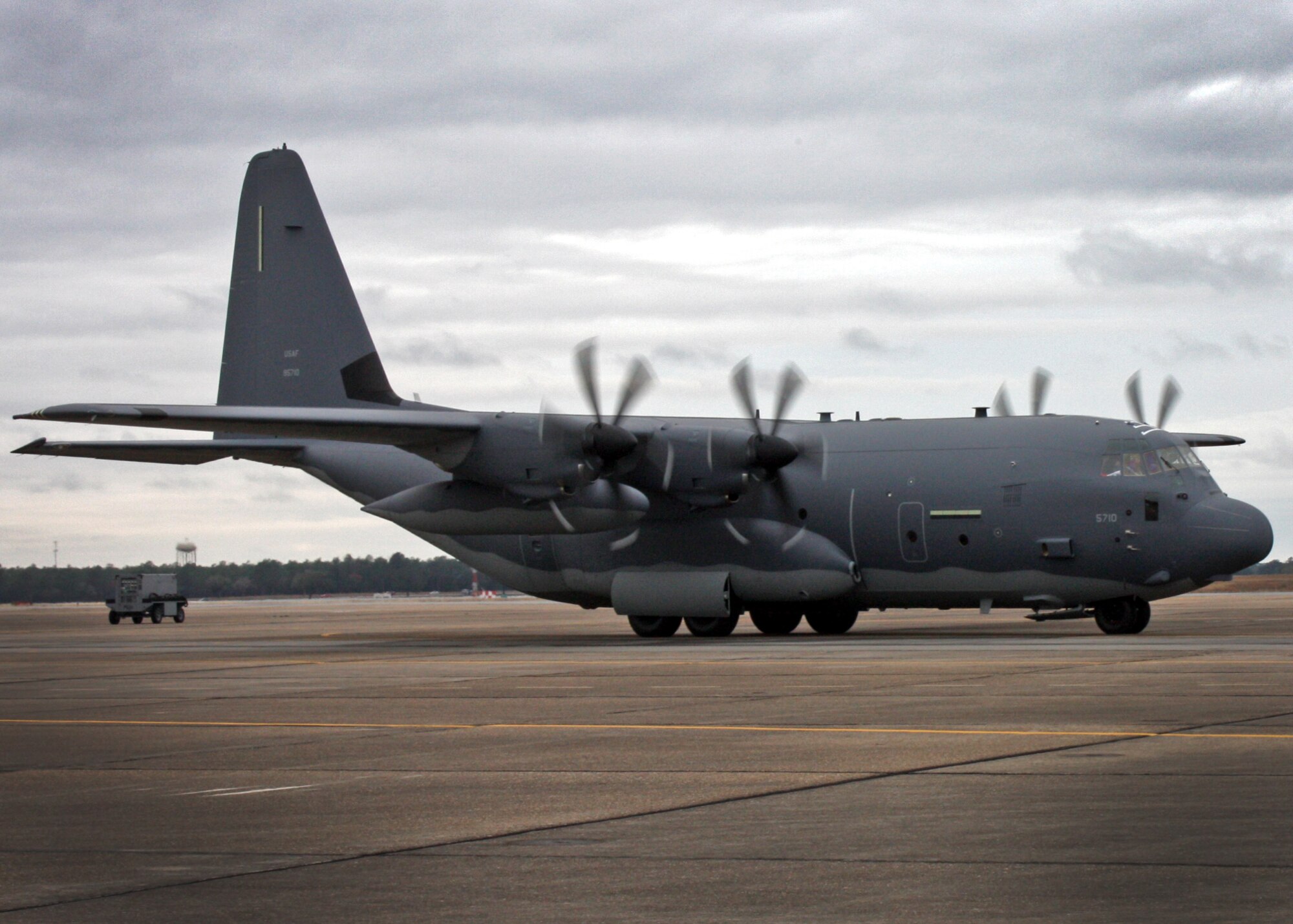 The first MC-130J to be converted into Air Force Special Operations Command’s newest variant of the gunship, the AC-130J Ghostrider, lands at Eglin Air Force Base, Fla., Jan. 3, 2013. Modifications to the airframe will be completed in ten months and will be a milestone in the recapitalization of the AC-130H/U fleet. (Courtesy photo)
