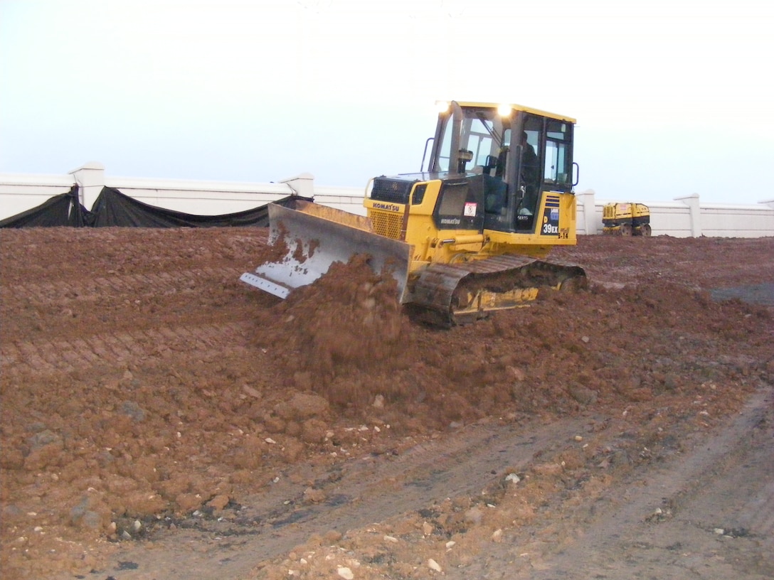 Repair work in Forty Fort, Pa. continues on Dec. 12 on the Wyoming Valley Flood Risk Management System. The grader is smoothing out dirt added for strength following Tropical Storm Lee in 2011. The Corps of Engineers, in coordination with the Luzerne County Flood Protection Authority, is using its authority under PL 84-99 to repair various damages caused by the storm.