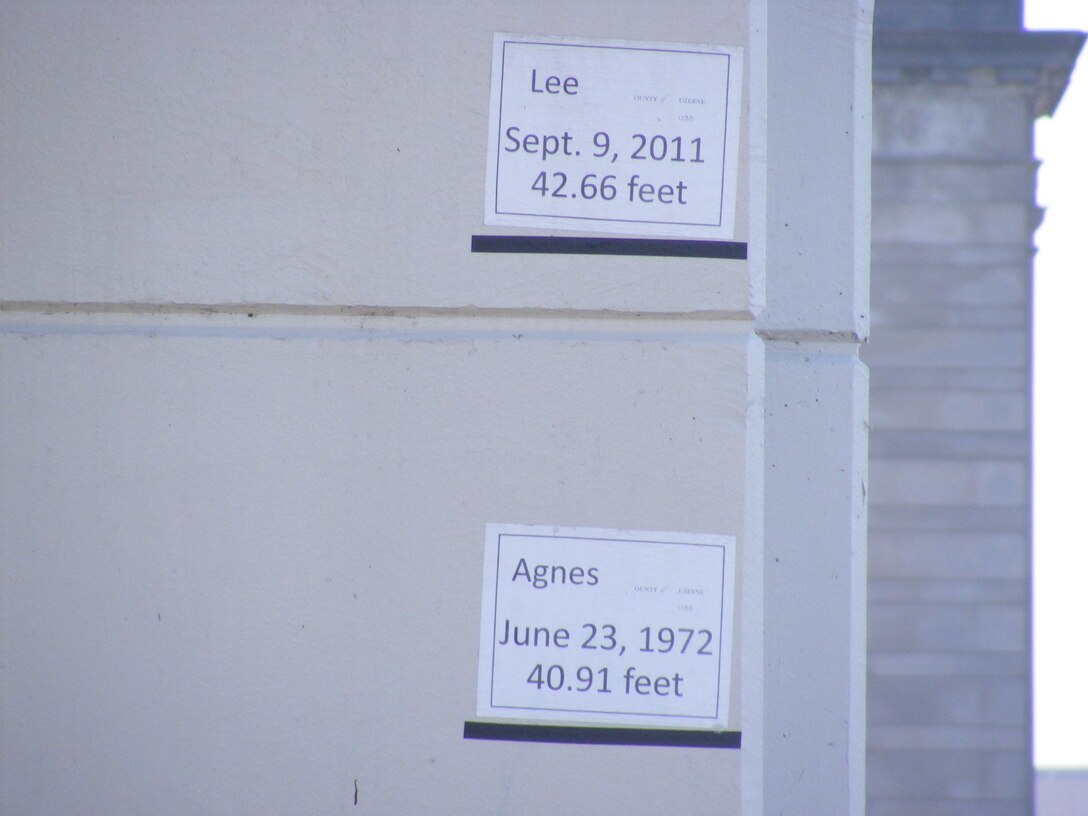 Simple markers attest to the power of the rising Susquehanna River at its highest flood stages in downtown Wilkes-Barre, Pa. Hurricane Agnes in June 1972 was the flood of record until Tropical Storm Lee in September 2011.