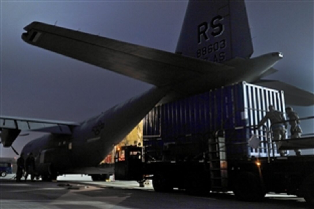 U.S. airmen help load cargo onto a C-130J Super Hercules on the flightline on Ramstein Air Base, Germany, Jan. 7, 2013. The airmen are assigned to the 86th Aircraft Maintenance Squadron and the 37th Airlift Squadron. The 86th Airlift Wing provides support to the NATO-led coalition that will augment Turkey's air defense capabilities.