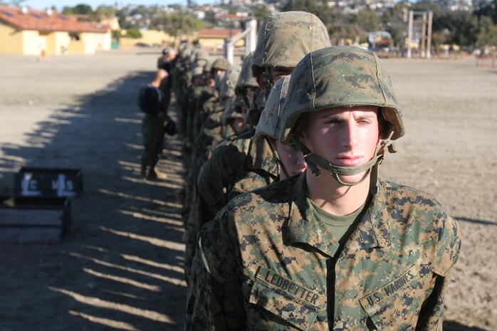 Recruits of Company M, 3rd Recruit Training Battalion, await their turn to rappel down a 60-foot tower aboard Marine Corps Recruit Depot San Diego Jan. 7. Recruits rappelled down the tower using the fast roping and rappelling technique.