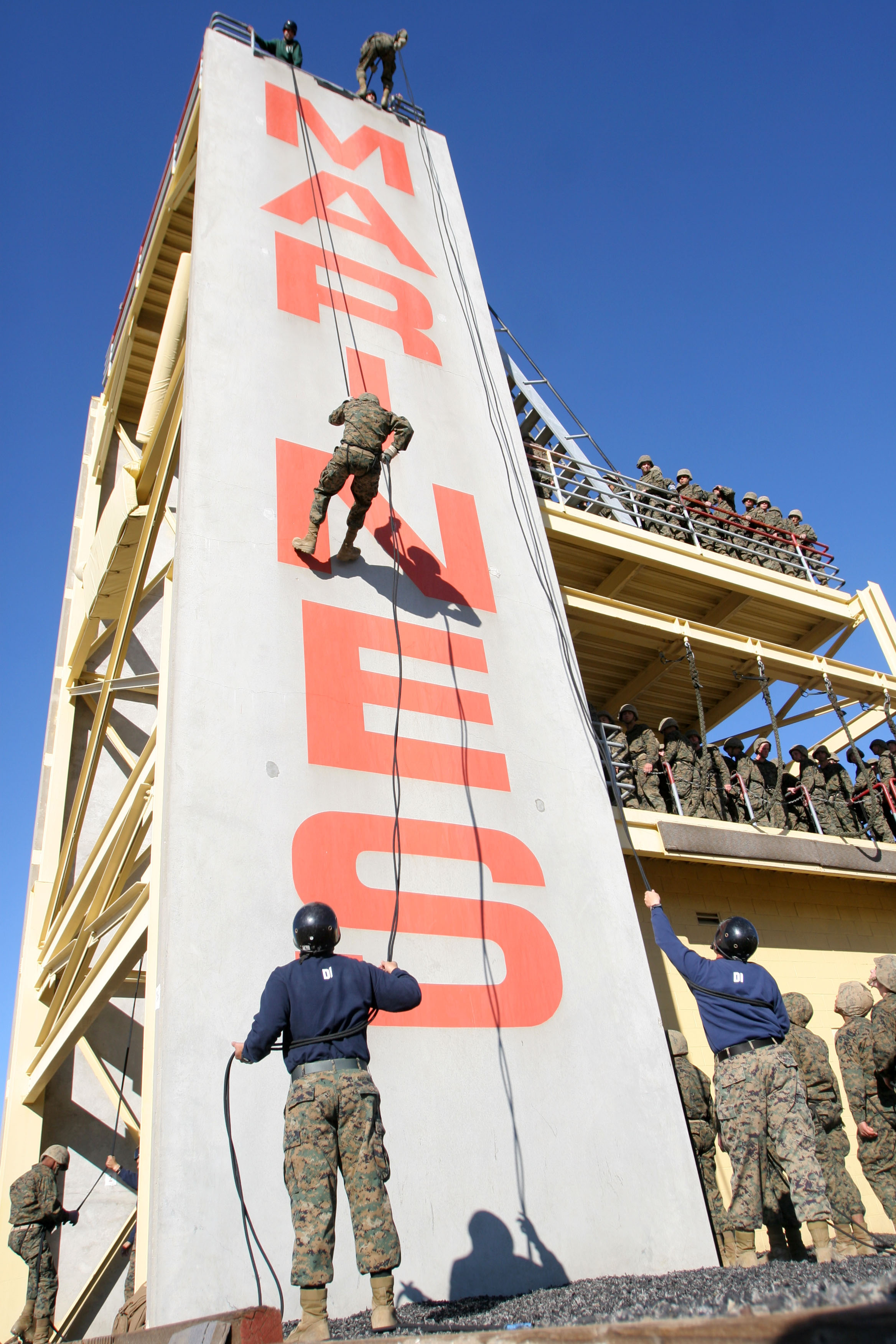 Recruits of Company M, 3rd Recruit Training Battalion, rappel down a ...